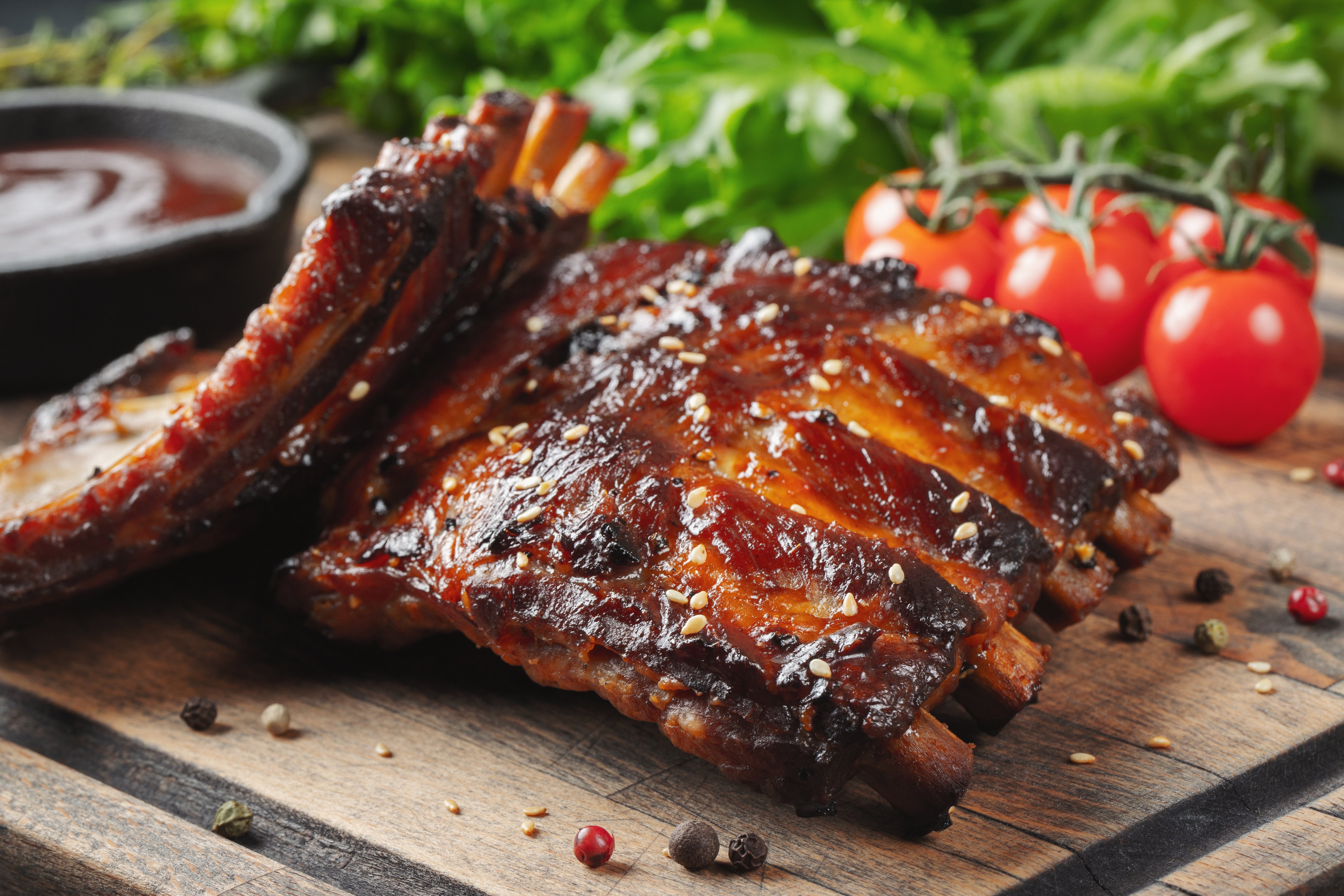 Delicious bbq ribs shown with barbecue sauce made using the Duronic AF34 dual air fryer