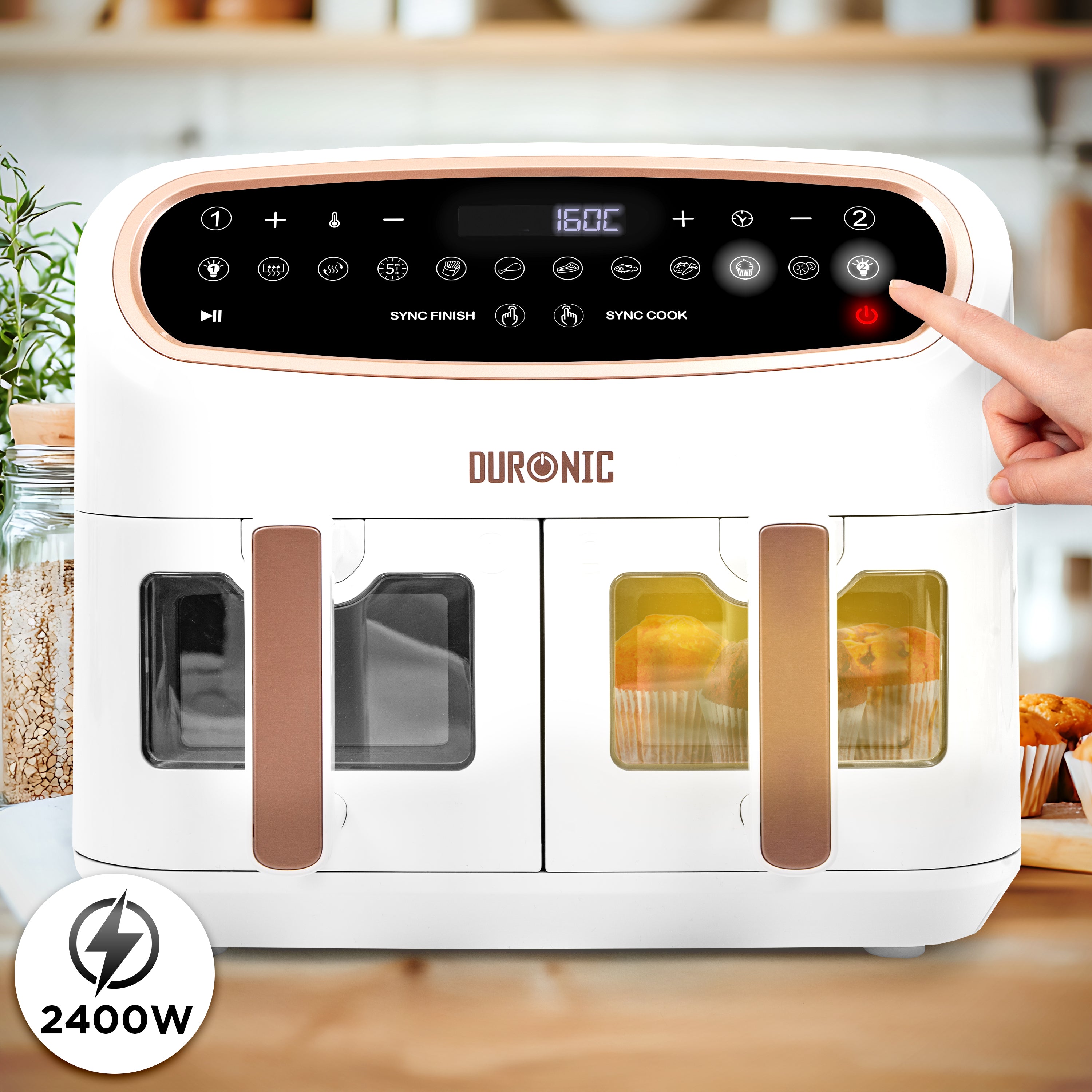 Duronic XXL Digital Air Fryer white and rose gold Duronic 2400W dual basket air fryer featuring a digital touch control panel and viewing windows to monitor cooking progress.