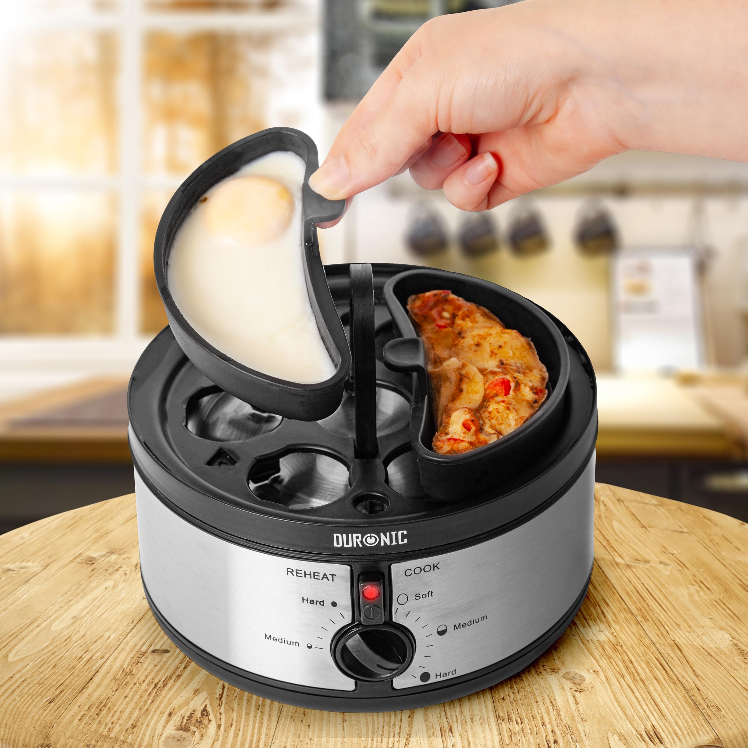 Duronic EB35 BK electric egg boiler cooking omelettes perfectly using the omelette tray provided