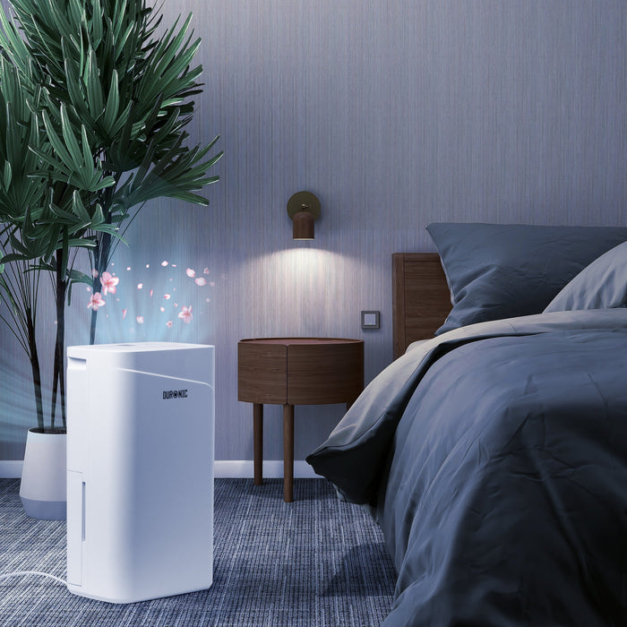 Duronic DH201 dehumidifier in use beside bed to improve sleep quality