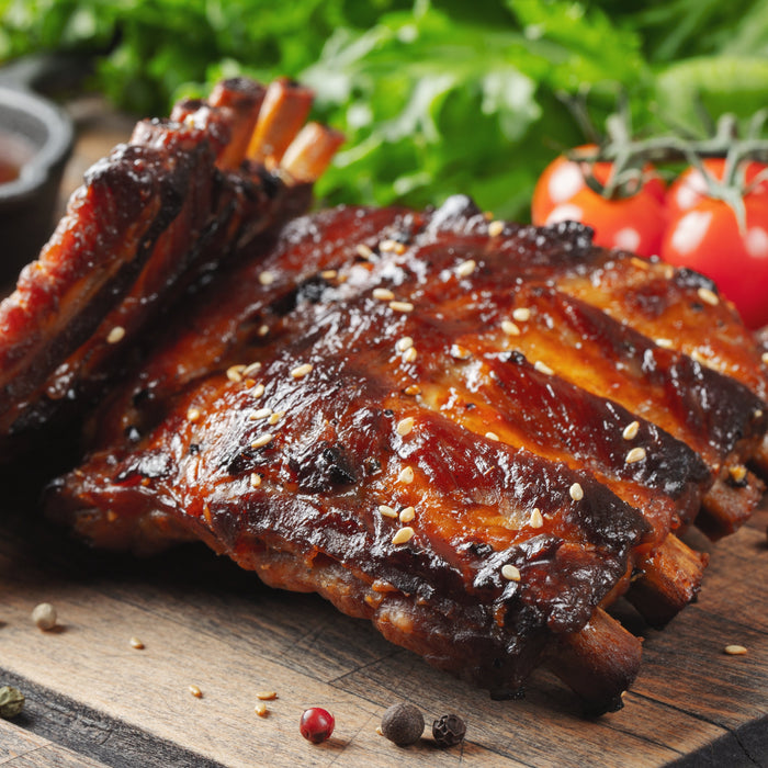Delicious bbq ribs shown with barbecue sauce made using the Duronic AF34 dual air fryer