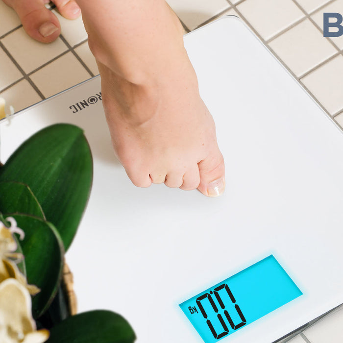 Duronic BS403 digital weighing scale preparing to measure weight on bathroom tile floor