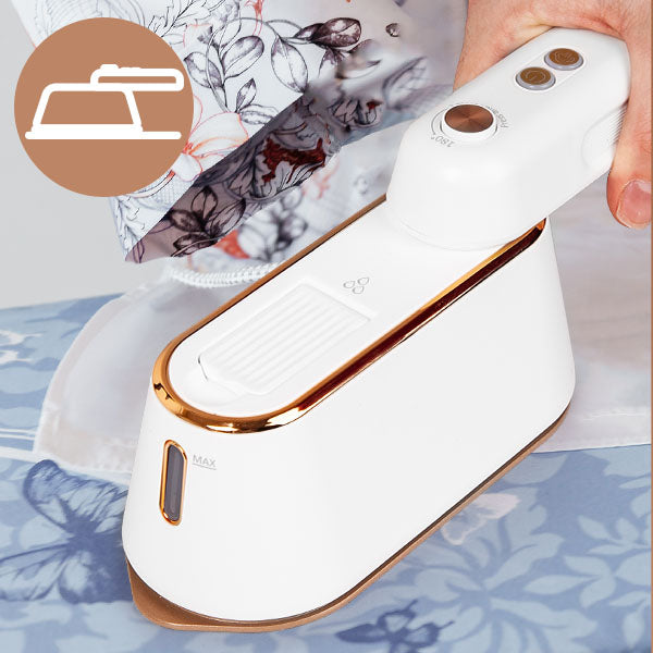 Duronic HS90 vertical steamer portable iron being used on top of ironing board
