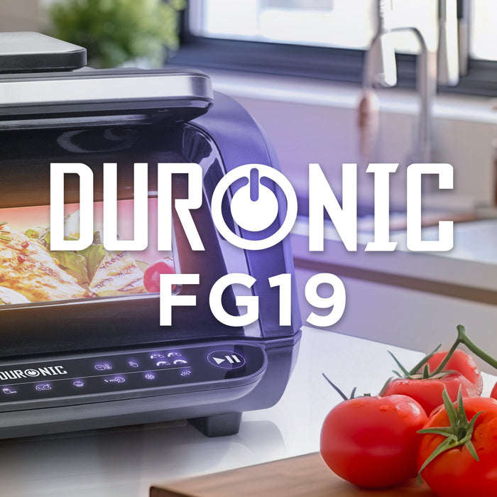 Duronic FG19 air fryer grill placed on an aesthetic kitchen countertop cooking fish and vegetables
