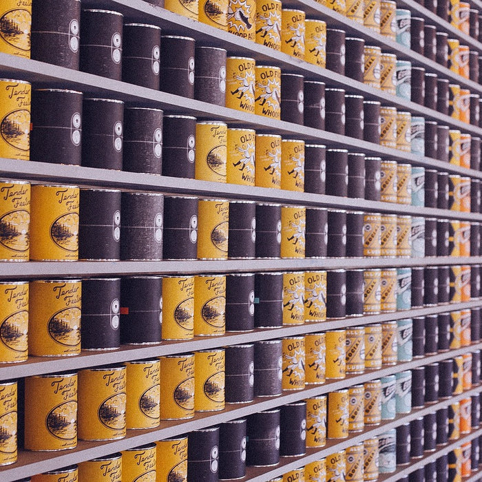 Canned food in tins on shelf to be opened using the Duronic electric can opener