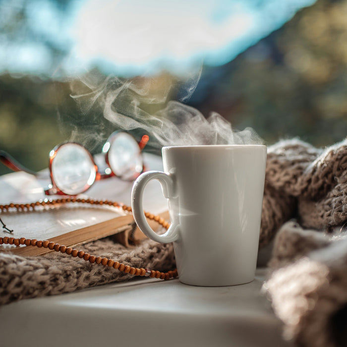 hot autumn drink with steam at the top milk frother drink coffee latte hot chocolate