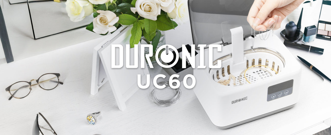 Duronic UC60 portable lightweight ultrasonic cleaner shown cleaning jewellery from grime, dirt and bacteria