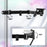 Adjustable black monitor mount arm with 180-degree swivel joints and 90-degree tilt for ergonomic screen positioning.
