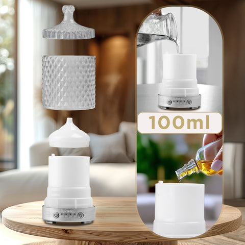 Duronic Aromatherapy Diffuser crystal-style essential oil diffuser showing its 100ml water tank, internal lid, and decorative outer glass being filled with water and fragrance oil.