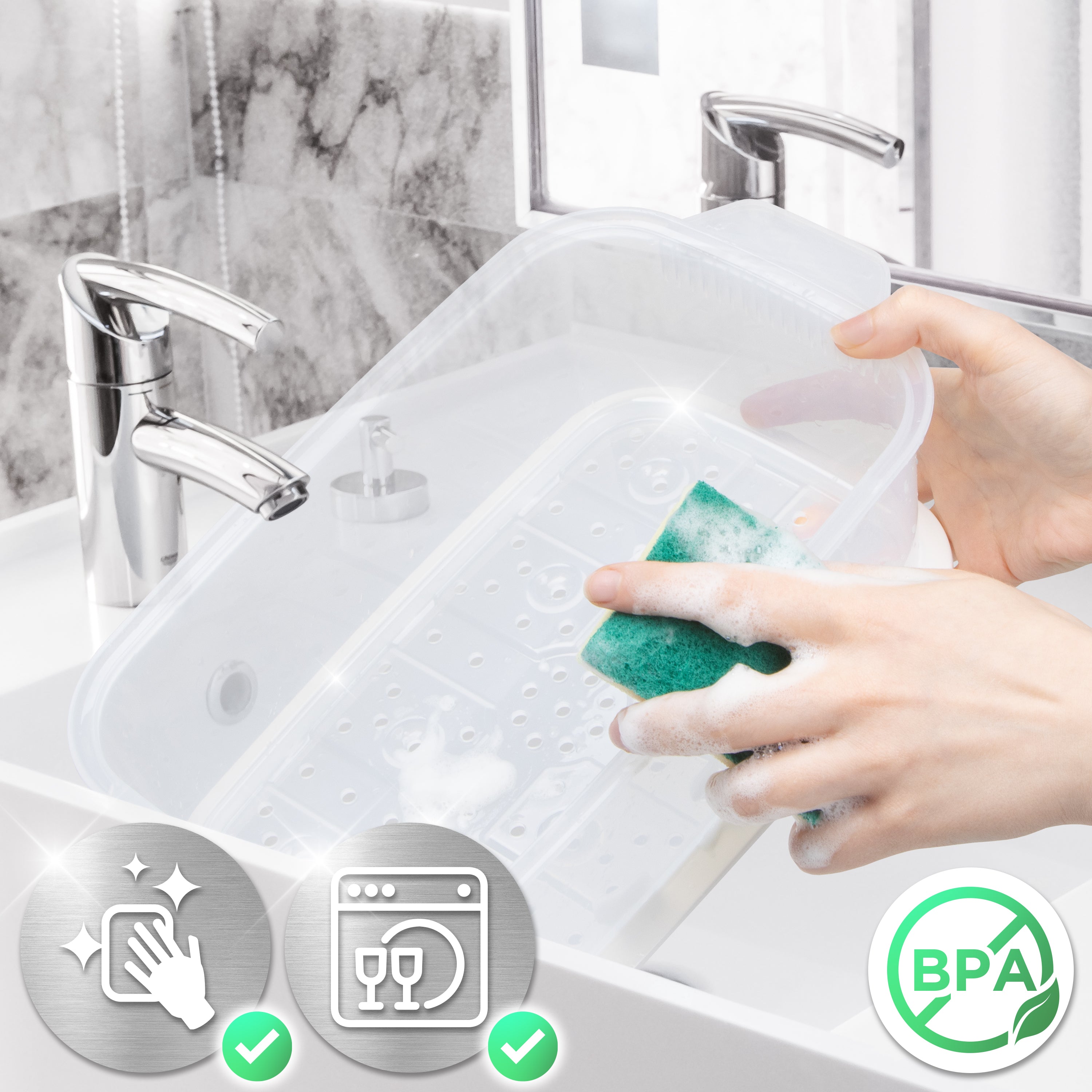 Duronic Black Electric Food Steamer using a green sponge in a bathroom sink.