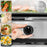Duronic Black Electric Food Steamer with 60-minute timer dial, showcasing steamed meals like salmon, chicken, and eggs.