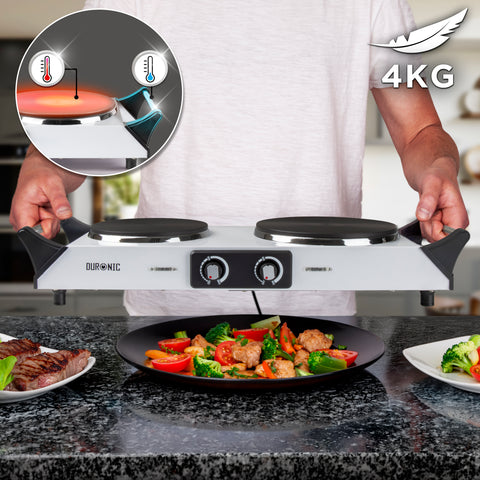 Duronic Electric Hot Plate HP2 WE with cool-touch handles held by a person.
