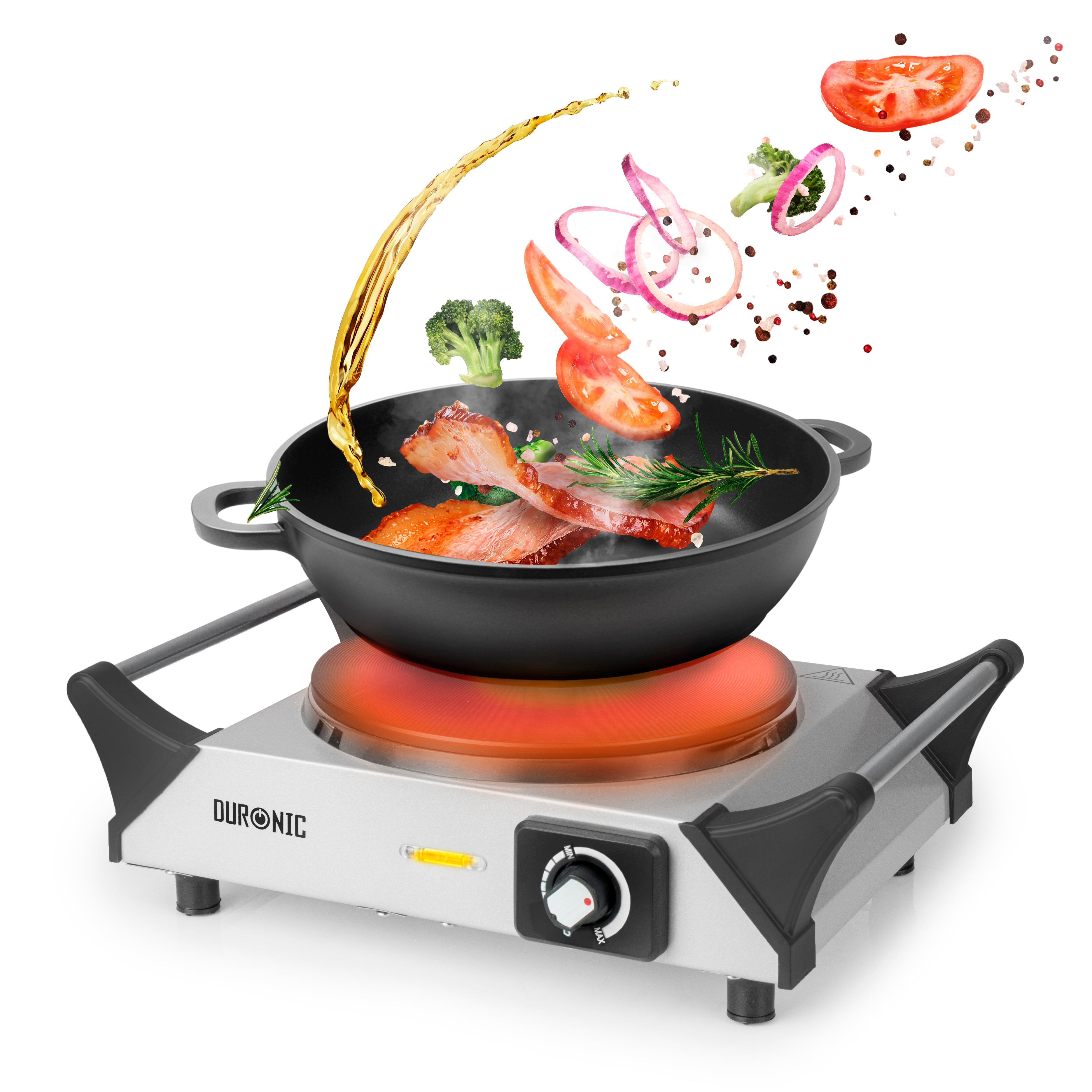 Duronic Electric Hot Plate with a wok frying bacon, broccoli, tomatoes, onions, and oil mid-air.