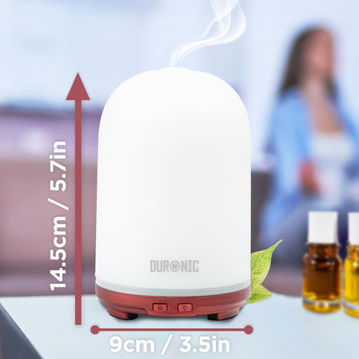 Duronic Essential Oil Diffuser with product dimension and oil on the side