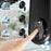 Duronic FN12 BK Wall Mounted Fan with control panel being pressed, showing 3 airflow speeds up to 6.2m/s.