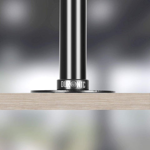 Duronic Grommet installed flat on a light wood desk surface.