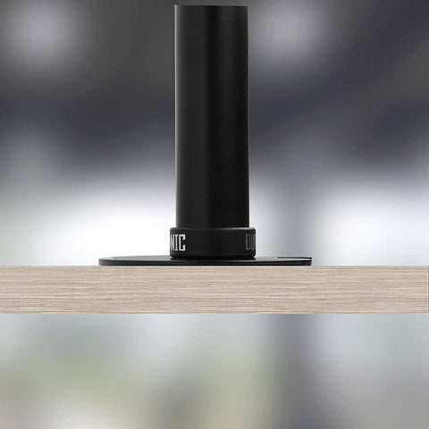 Duronic Grommet installed securely on a light wood desk surface close-up.