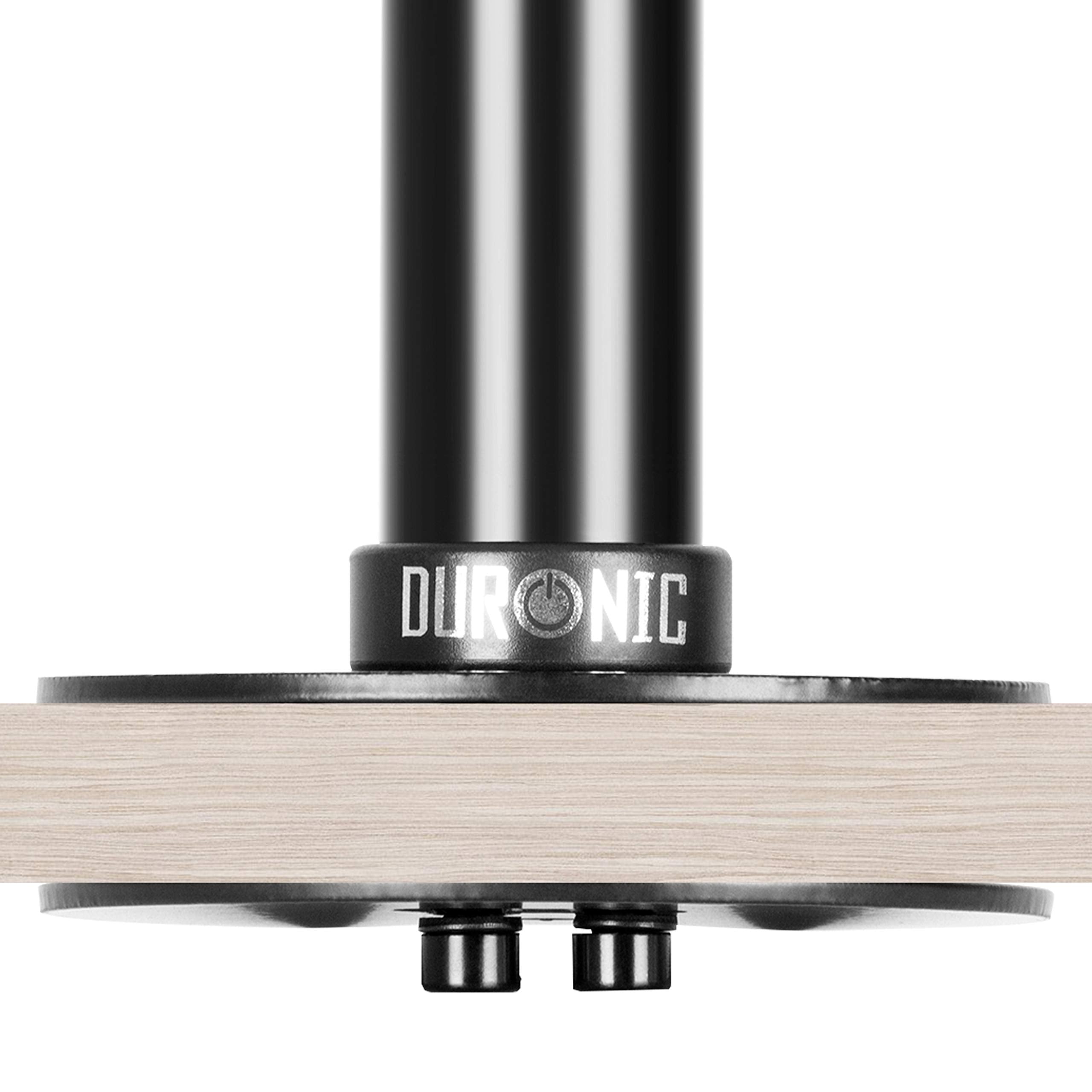 Duronic Grommet securely clamped to a light wood desk surface.