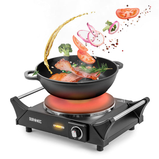 Duronic HP1 BK portable hot plate cooking meat, vegetables, spices on a pan for home, kitchen, camping, cooking