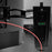 Duronic Monitor Arm Wall Mount featuring a built-in bubble level and cable management hook.
