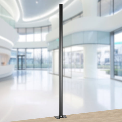 Duronic Monitor Stand Pole mount on a base inside a modern office lobby.