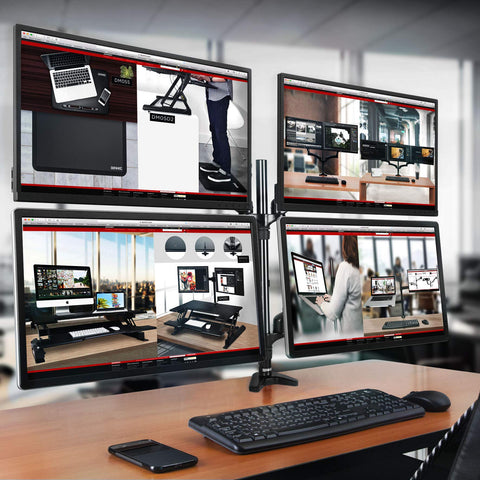 Duronic Quad Monitor Arm Stand displaying workspace product pages with a keyboard and smartphone in front.