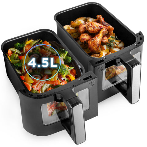 Duronic Twin Drawers AFD2 BK with 4.5L capacity drawers featuring viewing windows, shown filled with roasted vegetables in one side and chicken drumsticks with potatoes in the other.