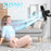 Duronic Wall Mounted Fan with a woman enjoying cool airflow
