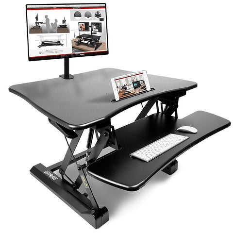 Duronic Sit-Stand Desk with monitor mount, keyboard tray, and tablet slot.