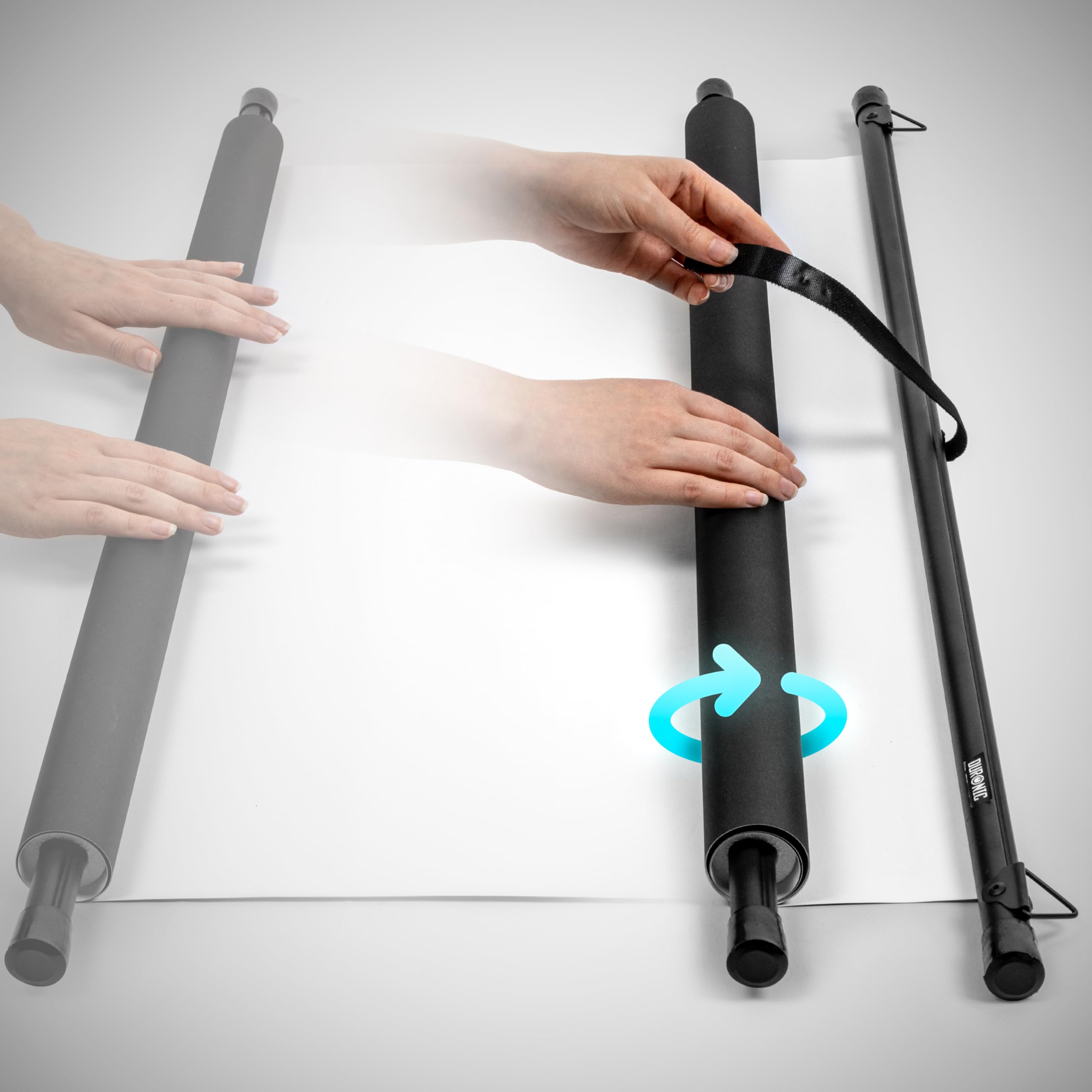 Duronic Bar Projector Screen demonstrates how to wrap a white backdrop around a padded black crossbar and secure it with a strap for easy storage and transport..