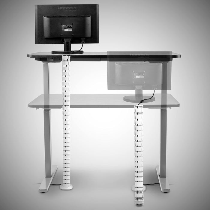 Duronic Cable Management Spine A white, flexible cable management spine attached to a height-adjustable standing desk, demonstrating how it neatly organizes and protects cords in both raised and lowered positions.