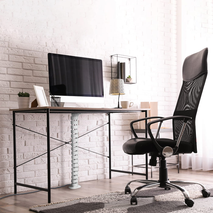 Duronic Cable Management Spine featuring a white modular cable management spine organized neatly under a wood-topped desk with a black mesh chair.