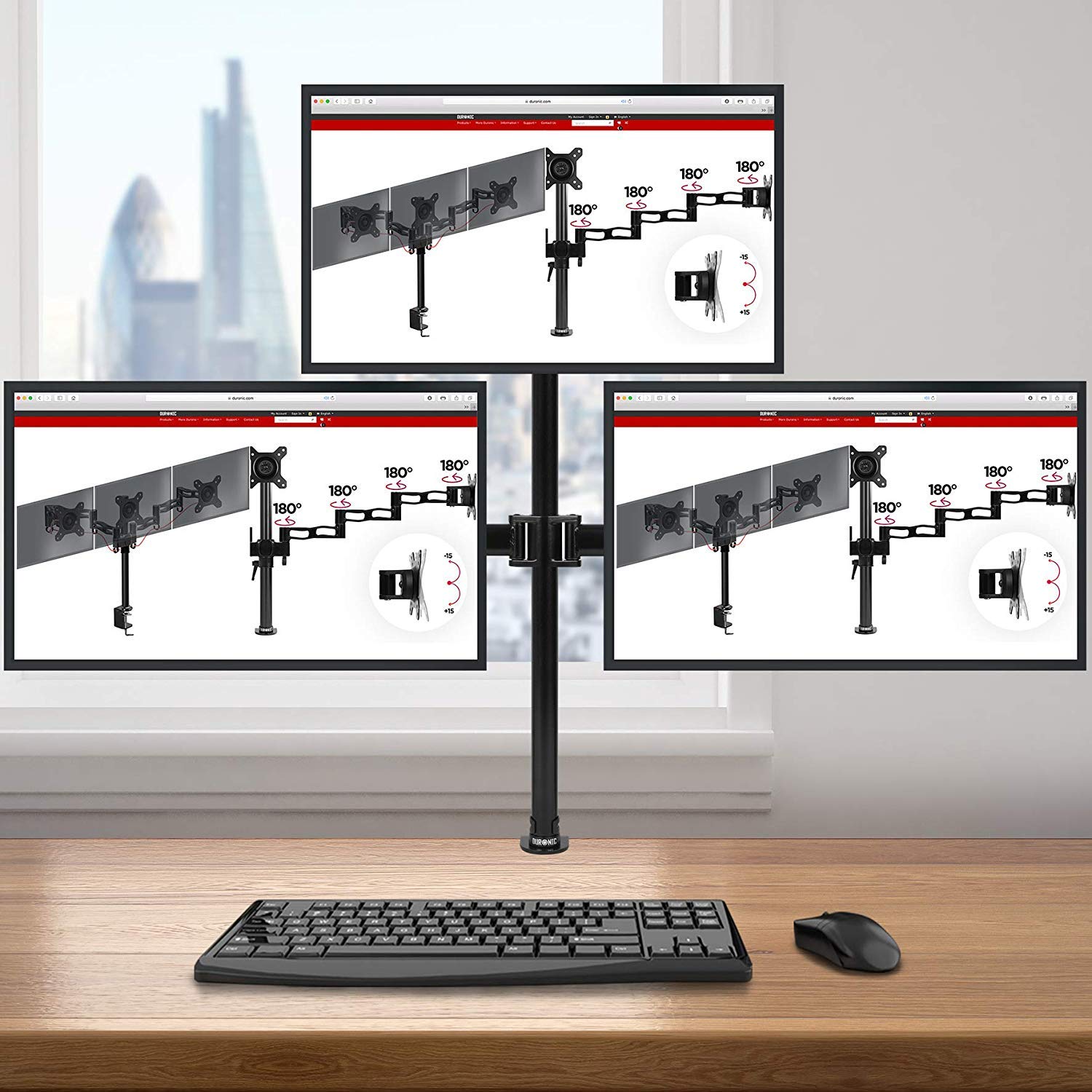 Duronic Computer Monitor Arms holding three screens above a desk with a keyboard and mouse.