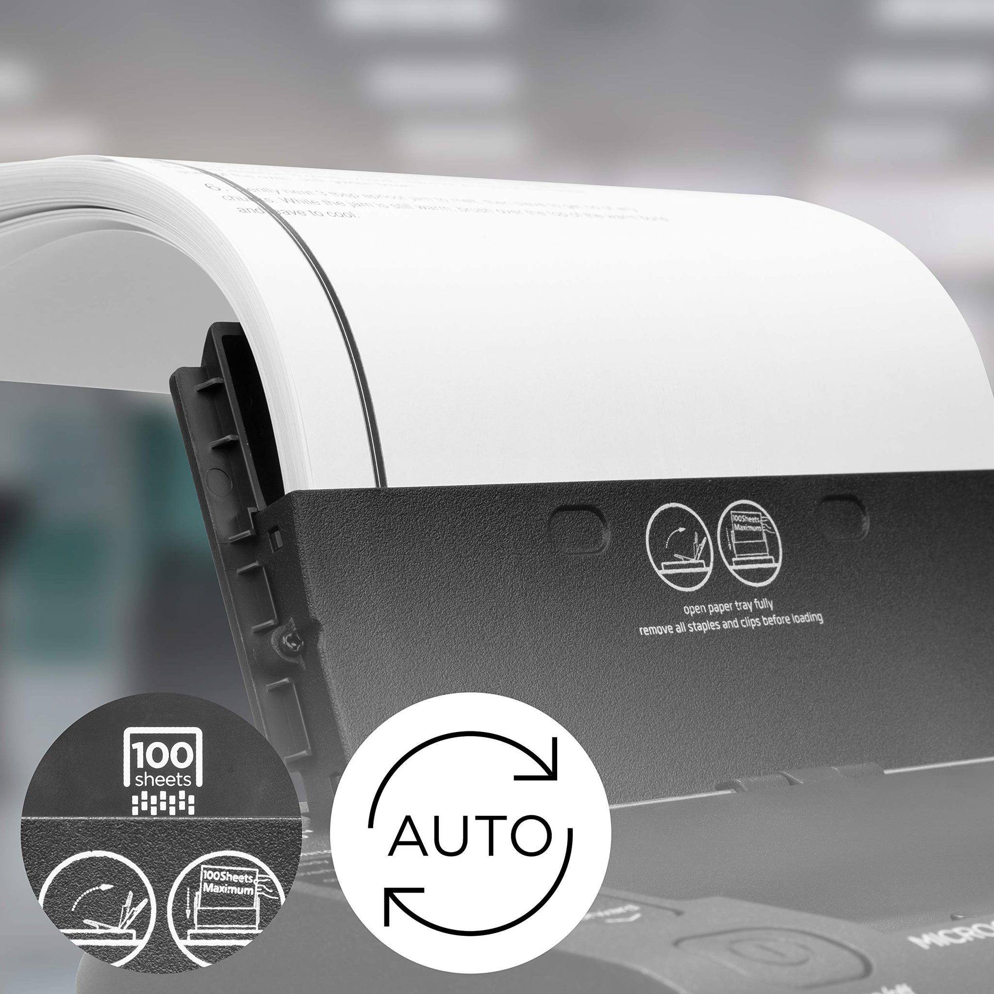 Duronic Cross Cut Paper Shredder holding a stack of 100 paper sheets.