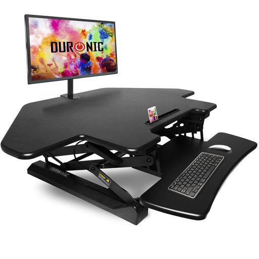 Duronic DM05D5 Corner Sit-Stand Desk featuring a large work surface, an integrated keyboard tray, and a mounted monitor.