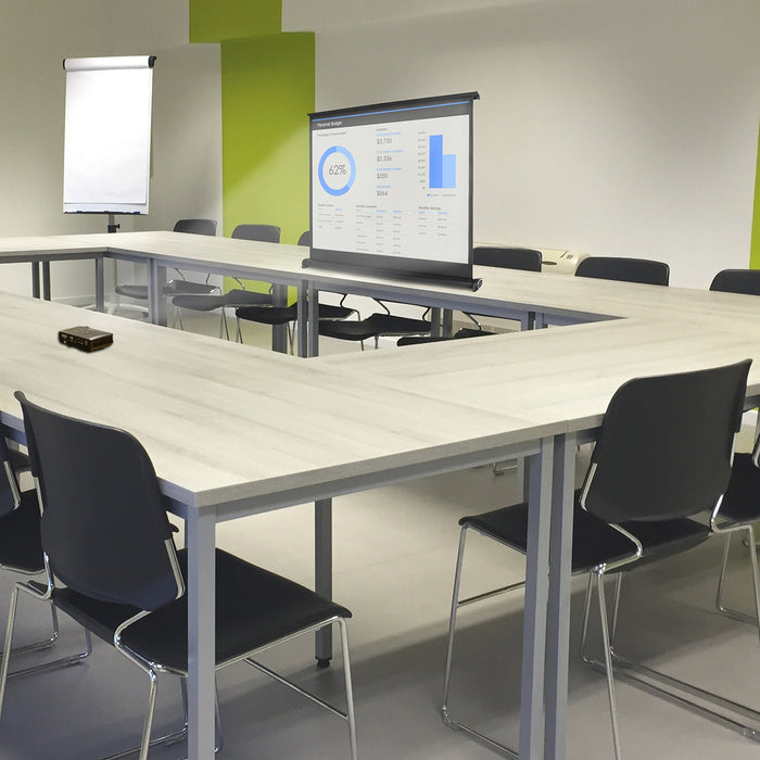 Duronic DPS40/43 portable projector screen placed on office business desk for engaging interactions