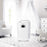 Duronic Dehumidifier with a digital display and integrated carry handle, shown in a bright and airy nursery setting.