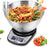 Duronic Digital Kitchen Scale with a stainless steel mixing bowl weighing colorful pasta, including two AAA batteries.