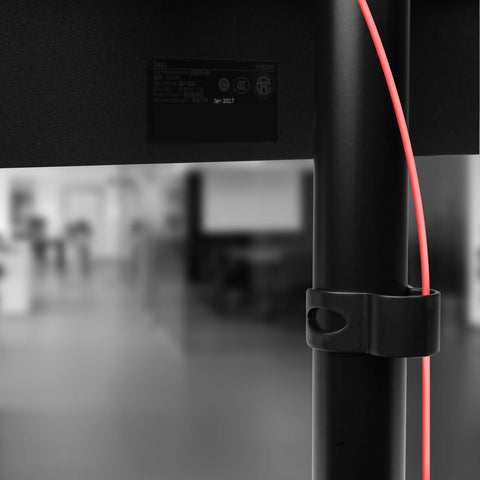 Duronic Dual Monitor Stand with a cable management clip holding a red wire.