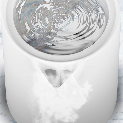Duronic Electric Kettle with boiling water ripples and steam escaping the spout.