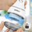 Duronic Fabric Shaver with its detachable transparent lint collector cap being removed for cleaning.