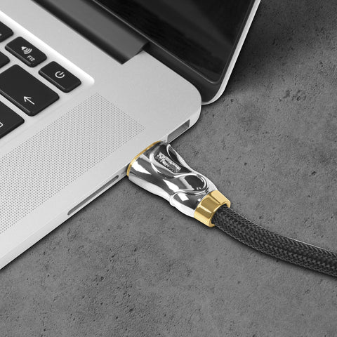 Duronic HDMI Cable plugged into the side port of a silver laptop.