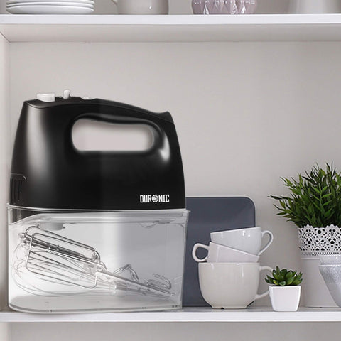Duronic Hand Mixer Electric stored neatly inside its clear, snap-on plastic storage case.
