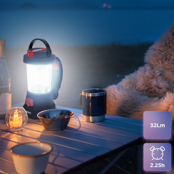 Duronic Hurricane camping torch placed on a table at night outdoors lantern mode with 32 Lumens and 2.25 hours runtime