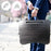 Duronic Laptop Tray with a man in a suit carrying the lightweight tray