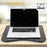 Duronic Laptop Tray with cushion base holding a 16-inch silver laptop on table.