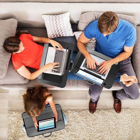 Duronic Laptop Tray with family using portable lap desks for laptops and tablets while relaxing together on a sofa.