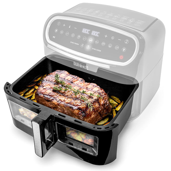 Duronic Large Drawer drawn with a large steak and potatoes in the open cooking drawer.