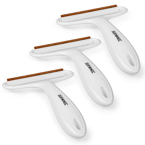 Duronic Lint Shaver with white ergonomic handles and copper scraping blades.