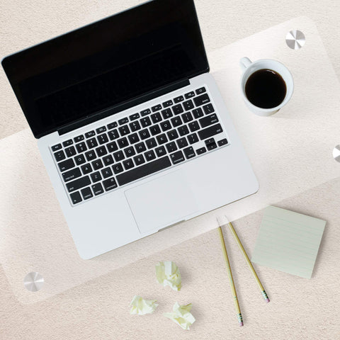 Duronic Monitor Stand Riser with Laptop, coffee cup, and notes on a clear acrylic desk mat over a textured background